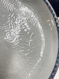 A Chinese floral anhua-decorated dish with blue and white rim, Yongzheng