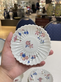 A pair of Chinese famille rose chrysanthemum-shaped cups and saucers, Yongzheng