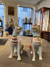 A pair of Chinese polychrome export porcelain models of dogs, Qianlong