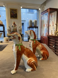 A pair of Chinese polychrome export porcelain models of dogs, Qianlong