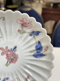 A pair of Chinese famille rose chrysanthemum-shaped cups and saucers, Yongzheng