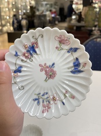 A pair of Chinese famille rose chrysanthemum-shaped cups and saucers, Yongzheng