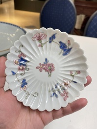 A pair of Chinese famille rose chrysanthemum-shaped cups and saucers, Yongzheng