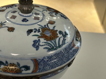 A rare Chinese doucai bowl and cover with silvered mounts, Kangxi/Yongzheng