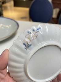 A pair of Chinese famille rose chrysanthemum-shaped cups and saucers, Yongzheng