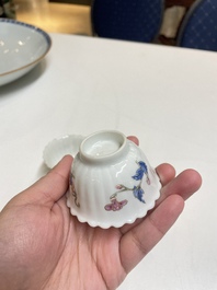 A pair of Chinese famille rose chrysanthemum-shaped cups and saucers, Yongzheng