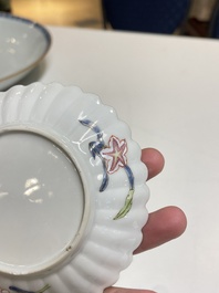 A pair of Chinese famille rose chrysanthemum-shaped cups and saucers, Yongzheng