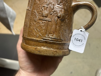 An unusual German stoneware mug depicting king Gambrinus, Cologne or Frechen, ca. 1600