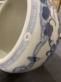 Two Chinese blue and white fish bowls or jardini&egrave;res with figurative design and mythical animals, 19/20th C.