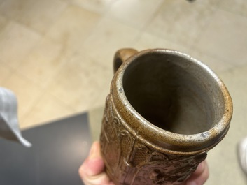 An unusual German stoneware mug depicting king Gambrinus, Cologne or Frechen, ca. 1600