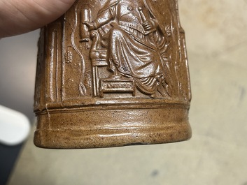 An unusual German stoneware mug depicting king Gambrinus, Cologne or Frechen, ca. 1600
