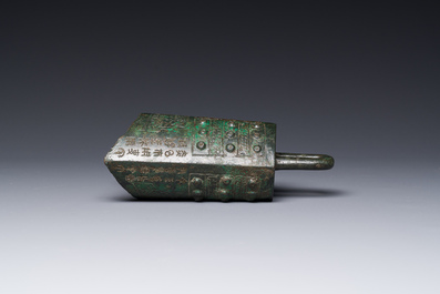 A rare Chinese inscribed archaic bronze bell, Eastern Zhou