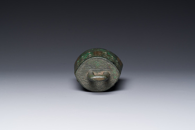 A rare Chinese inscribed archaic bronze bell, Eastern Zhou