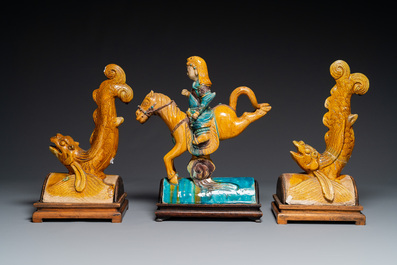 A pair of Chinese sancai roof tiles in the shape of a fish and a warrior on horseback, Ming