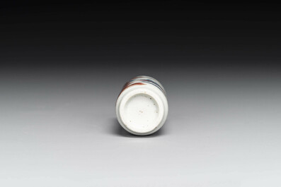 A Chinese blue, white and copper-red snuff bottle with inscription, 19th C.