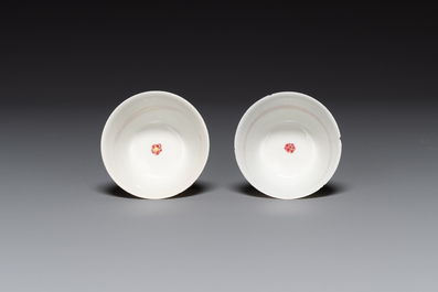 A pair of Chinese famille rose cups and saucers with horses, Yongzheng