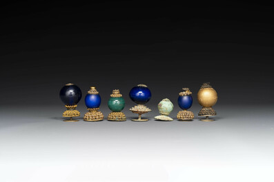 Seven Chinese gilt bronze Mandarin hat finials, Qing