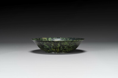 A Chinese dark green jade bowl, 18th C.