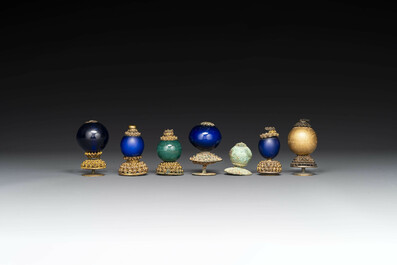 Seven Chinese gilt bronze Mandarin hat finials, Qing