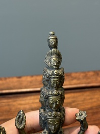 A collection of Chinese and Sino-tibetan bronze sculptures and paper weights, Qing