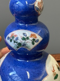 A pair of Chinese famille verte powder-blue-ground triple gourd 'antiquities' vases, Kangxi