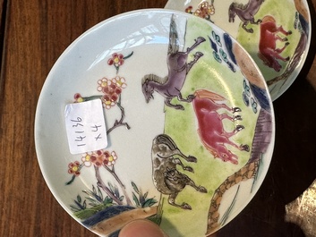 A pair of Chinese famille rose cups and saucers with horses, Yongzheng