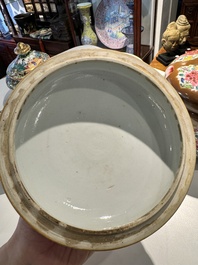 A pair of Chinese capucin-brown-ground famille rose covered bowls with floral design, Yongzheng/Qianlong