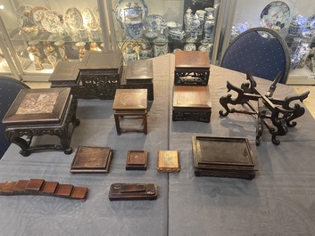 A collection of 26 varied Chinese wooden stands, 2 with marble tops, 19/20th C.