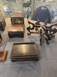 A collection of 26 varied Chinese wooden stands, 2 with marble tops, 19/20th C.