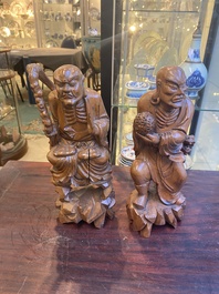 A group of Chinese boxwood sculptures of 18 Luohan, 20th C.