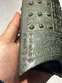 A rare Chinese inscribed archaic bronze bell, Eastern Zhou