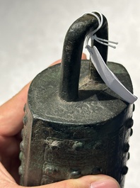 A rare Chinese inscribed archaic bronze bell, Eastern Zhou