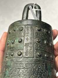 A rare Chinese inscribed archaic bronze bell, Eastern Zhou