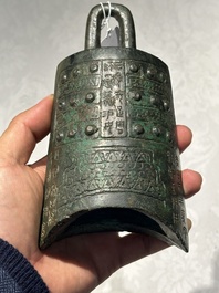 A rare Chinese inscribed archaic bronze bell, Eastern Zhou