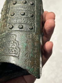 A rare Chinese inscribed archaic bronze bell, Eastern Zhou