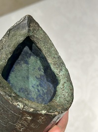 A rare Chinese inscribed archaic bronze bell, Eastern Zhou