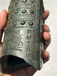 A rare Chinese inscribed archaic bronze bell, Eastern Zhou