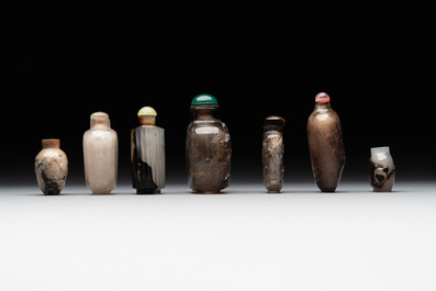 Seven Chinese smoky quartz, agate and hardstone snuff bottles, 19/20th C.