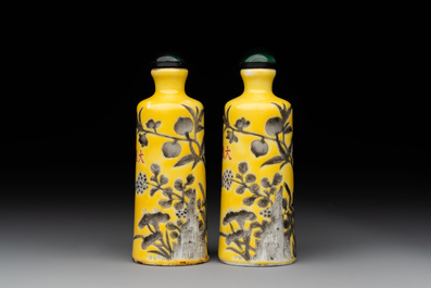 A pair of Chinese grisaille yellow-ground Dayazhai-style snuff bottles, Yong Qing Chang Chun 永慶長春 mark, 19th C.