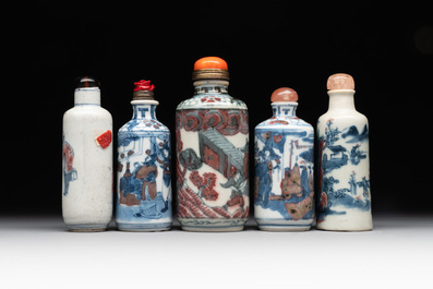 Five Chinese blue, white and copper-red snuff bottles, 19/20th C.