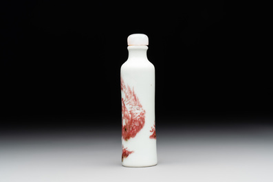 A Chinese copper-red snuff bottle with travellers in a landscape, Qianlong mark, 19th C.