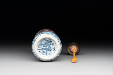 A Chinese blue, white and copper-red snuff bottle with a dragon, dragon mark, 19th C.