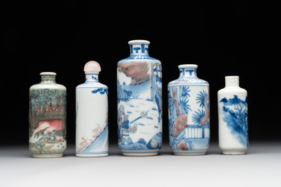 Four Chinese blue, white and copper-red snuff bottles and a blue and white snuff bottle, 19/20th C.