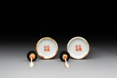 A pair of Chinese grisaille yellow-ground Dayazhai-style snuff bottles, Yong Qing Chang Chun 永慶長春 mark, 19th C.