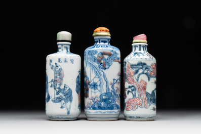 Three Chinese blue, white and copper-red snuff bottles, 19/20th C.