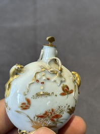 A Chinese iron-red and gilt-decorated snuff bottle, Yongzheng/Qianlong