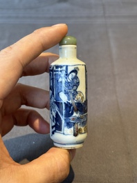 A Chinese blue, white and copper-red 'warriors' snuff bottle, Kangxi mark, 19th C.