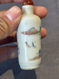 A Chinese blue, white and copper-red 'landscape' snuff bottle, 19th C.