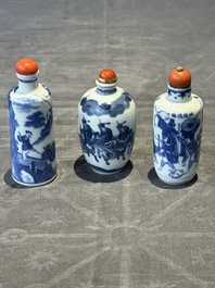 Two Chinese blue and white snuff bottles and a blue, white and copper-red snuff bottle, Yongzheng mark, 19th C.