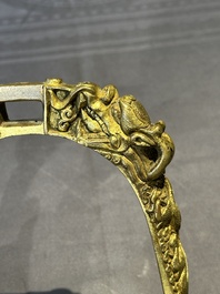 A pair of Chinese imperial gilt-bronze stirrups with dragons, De 德 mark, 18th C.